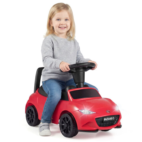 Sõiduauto tulede, ümberminekuvastase kaitse ja istme all oleva panipaigaga. Punane lastele mõeldud sõiduauto.