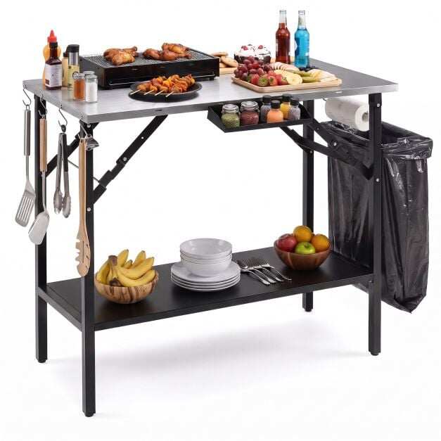 Folding camping table with 1 stainless steel worktop. Portable grill table with spice rack. Folding camping table with 1 stainless steel worktop. Portable grill table with spice rack.